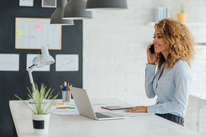 Latina Businesswoman Working In Her Office